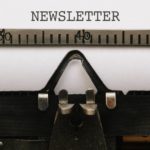 Paper with Newsletter text in old typewriter