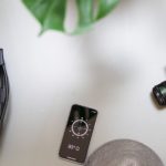 Travel items flat lay in greyscale