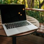 laptop on the table in the garden