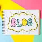 Notebook with drawing Blog on multicolor background