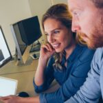 Software engineers working on project and programming in company