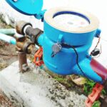 Close up blue water meter