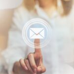 Hand of business woman pressing button icon email, Concept of communication and working online.