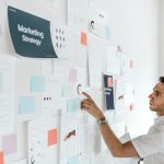 A casual business man checking a marketing plan