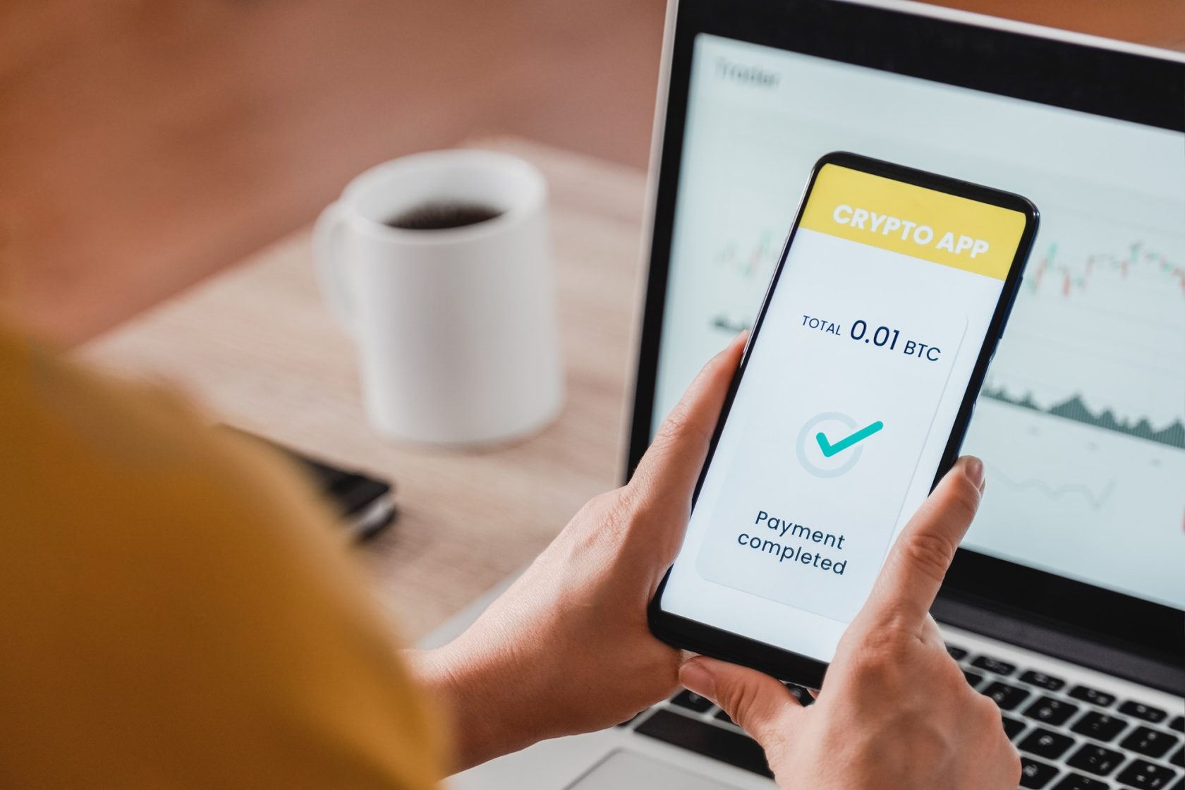 Trader using bitcoin crypto payment service app with mobile phone - Cryptocurrency trend technology