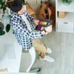 Thinking man working with color choice in office