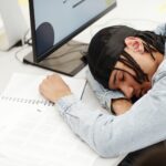 Student Sleeping on Desk