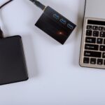 External hard disk and keyboard laptop computer transfer photos