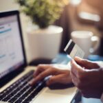 Online purchase on laptop with credit card