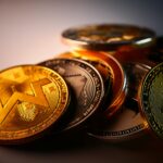 Closeup of monero, bitcoin, and other cryptocurrencies golden coins